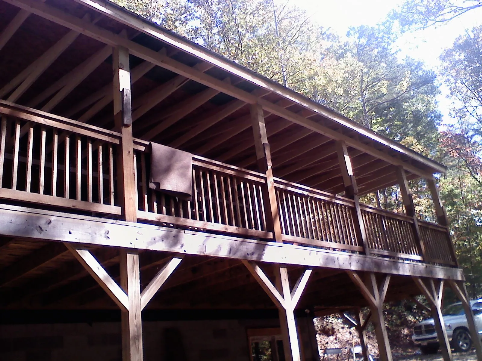 Timber framing under a new elevated porch and deck — Roof Leak Repair in Eatonton by Roofing Brothers